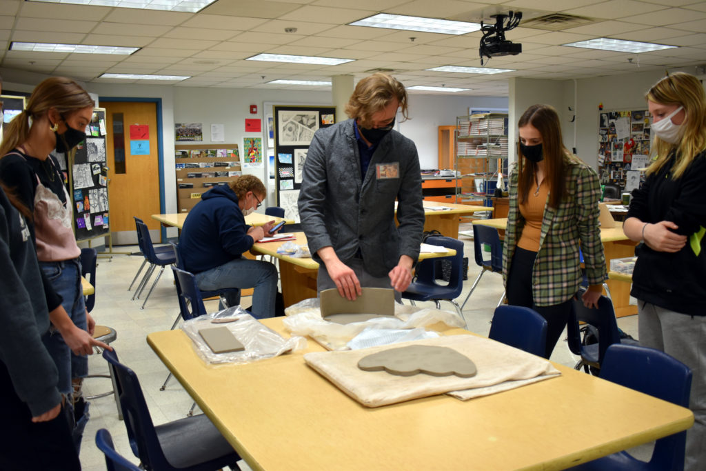 Student teacher at table