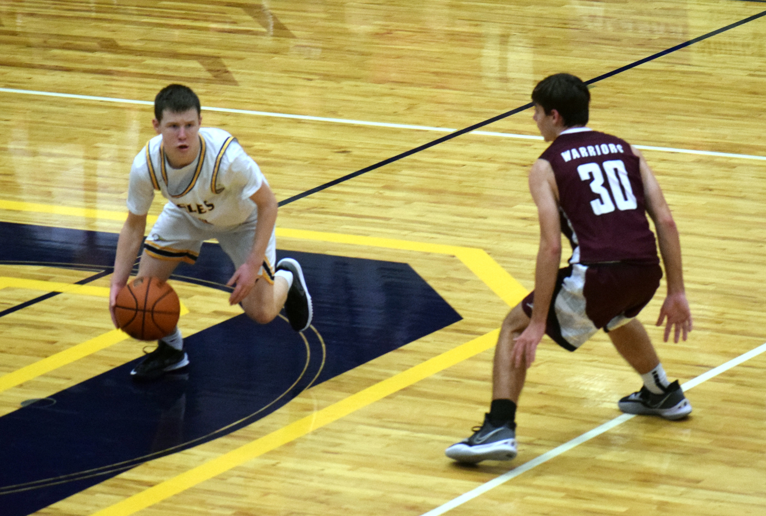 Guard dribbles