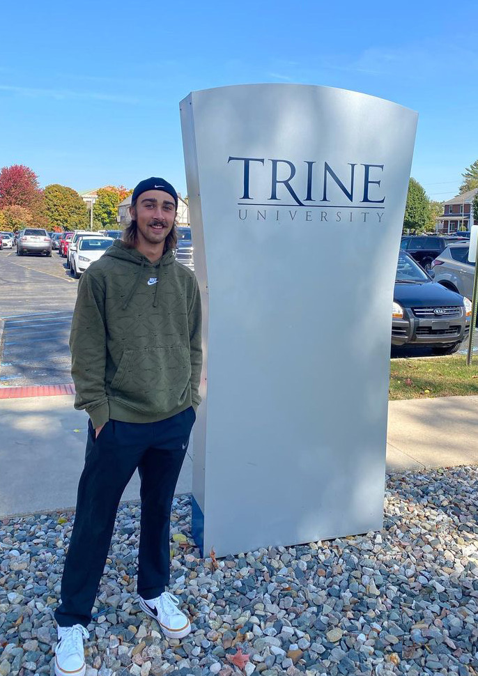 Student at Trine sign