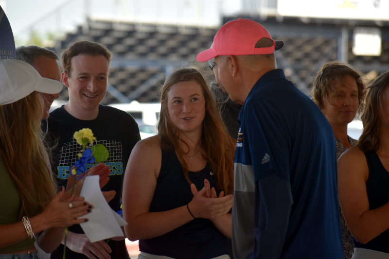 Wegener has played tennis for three years at Delta. She is pictured on her senior night next to Coach Tim Cleland. (Photo taken by James Root)