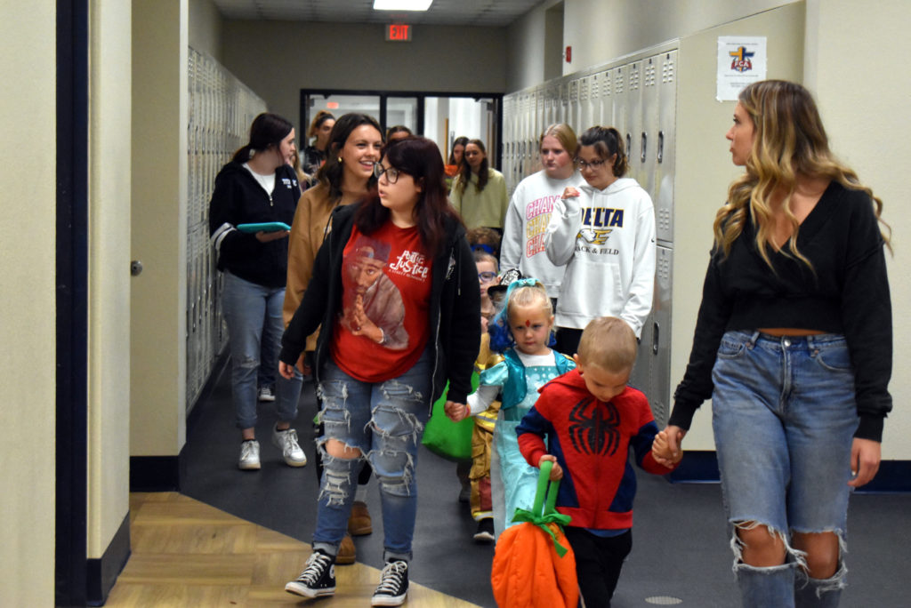 Students walk with buddies