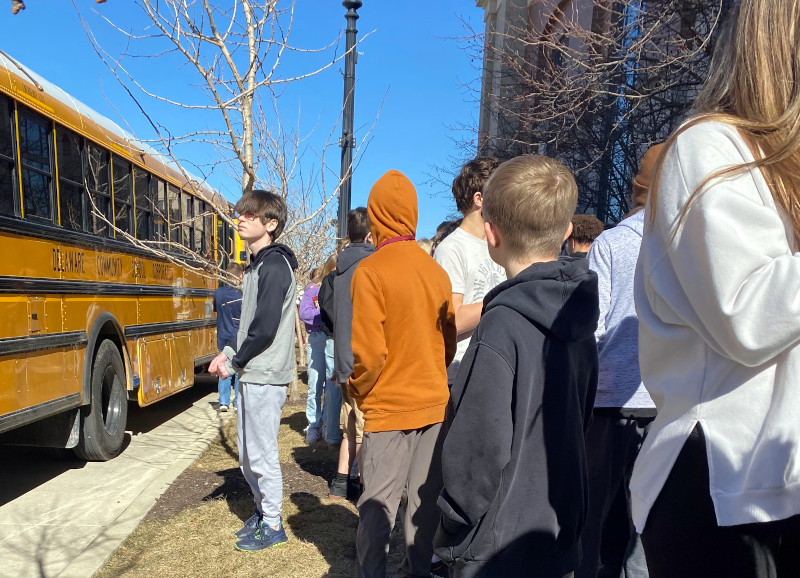 Kids in line for bus