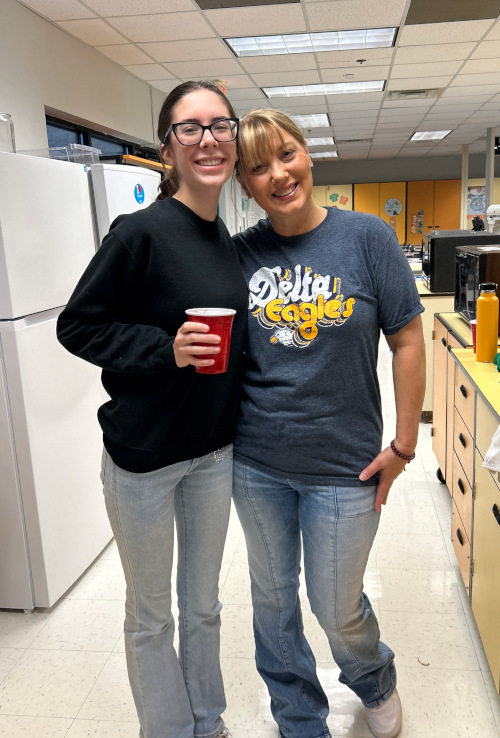 Teacher with student