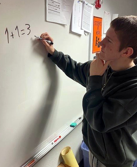 Student at board