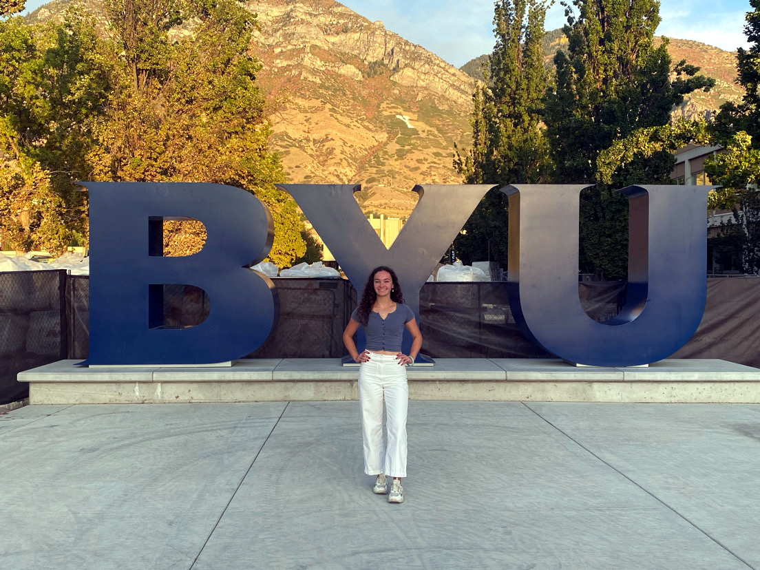 Girl at BYU sign