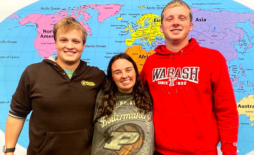 Students with world map