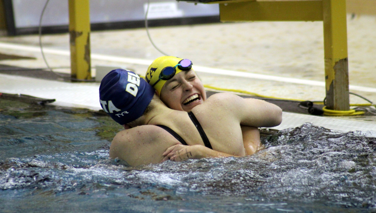 Jordan and El hugging 