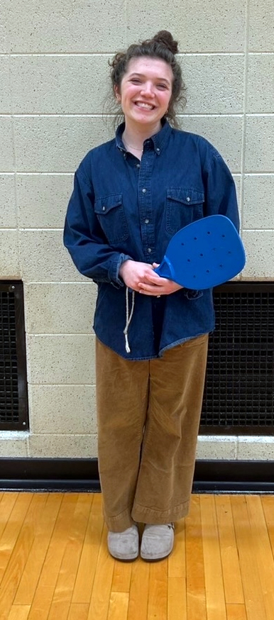 Teacher with pickleball paddle