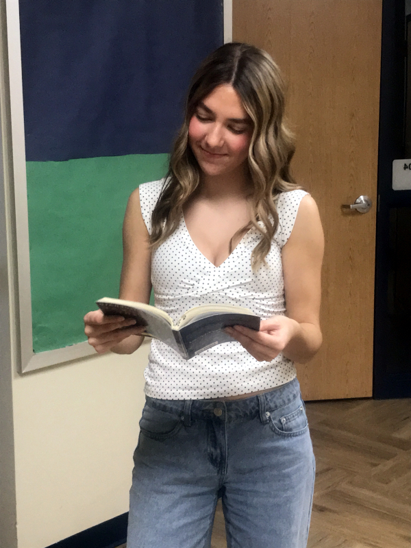 Kylee Robles reading a book