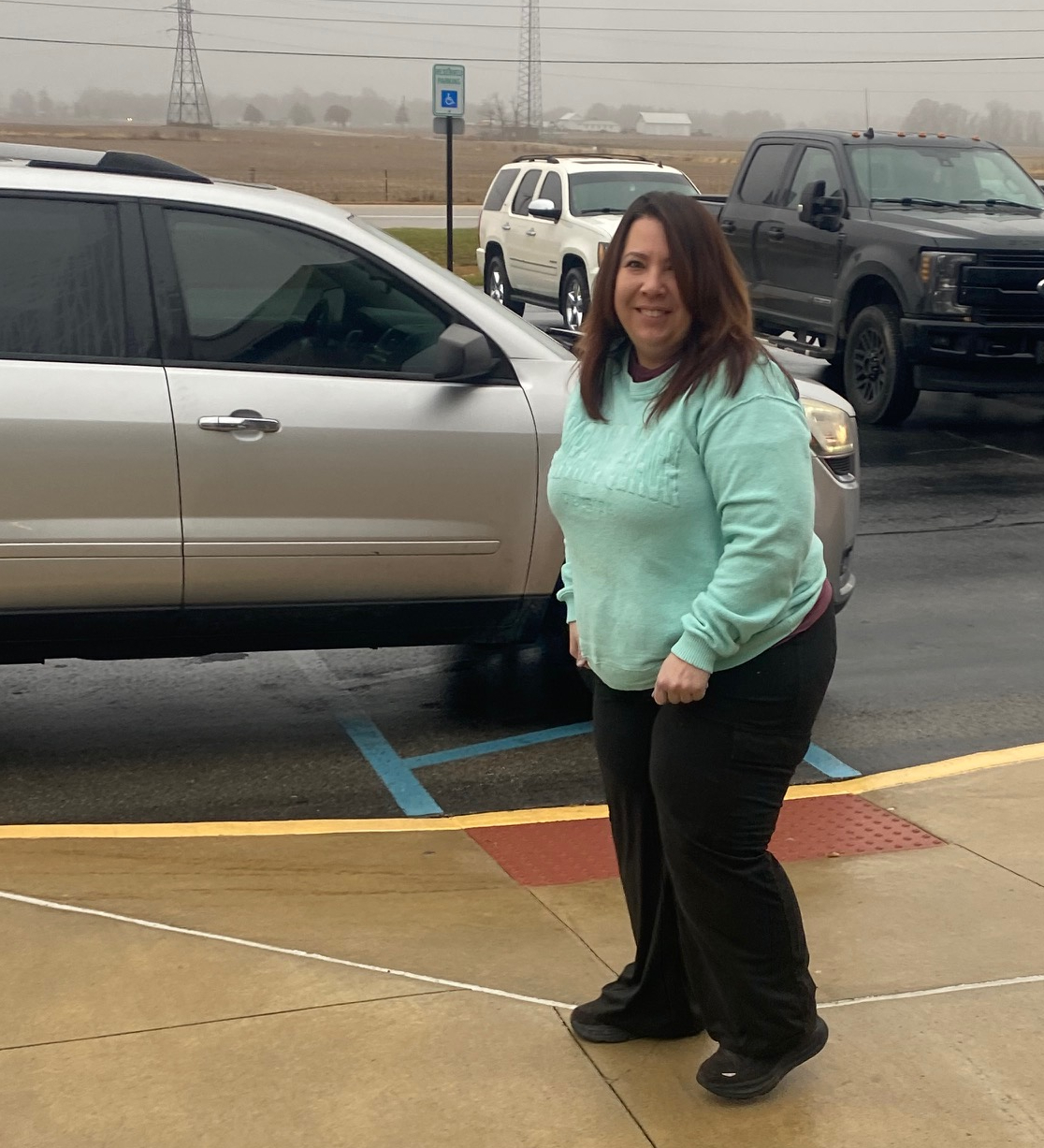 Mother outside by van