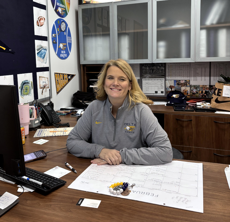 Athletic director at desk